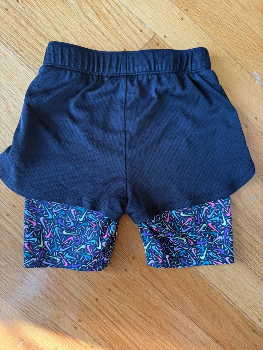 Nike Purple Graphic Tank with Black Shorts and Multicolor Patterned Bike Shorts - Picture 5 of 7